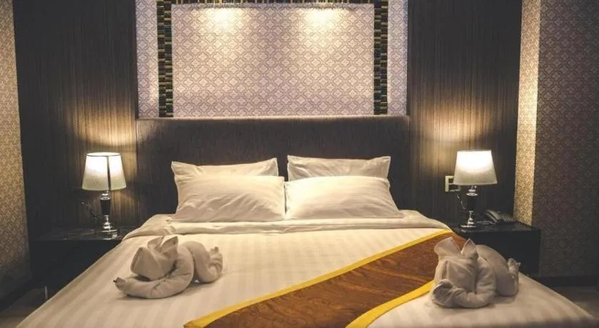 Bed in OYO 1130 CK Resort Pattaya