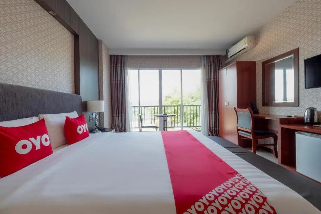 Bed in OYO 1130 CK Resort Pattaya