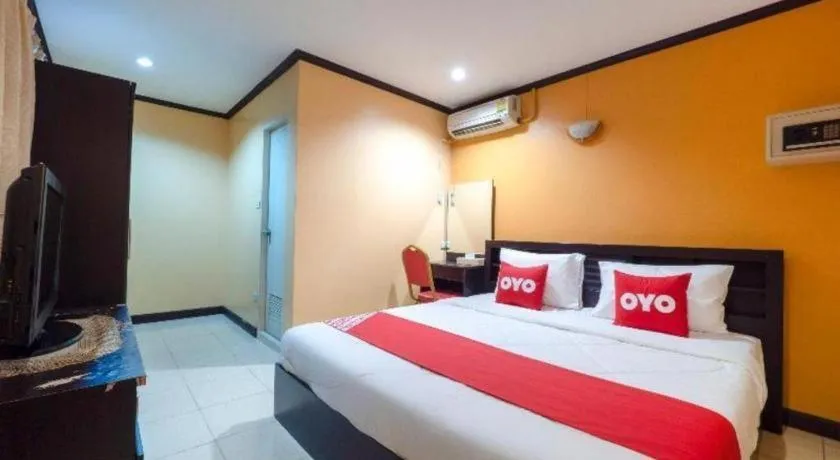 Bed in OYO 75327 Diyana Residence