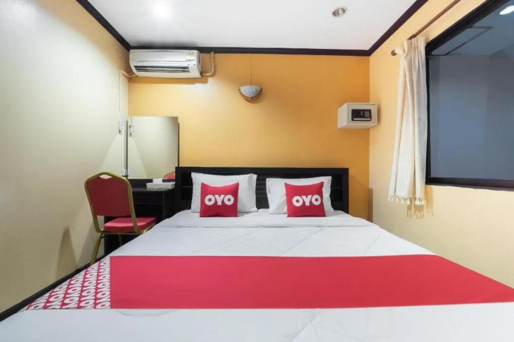 Bed in OYO 75327 Diyana Residence