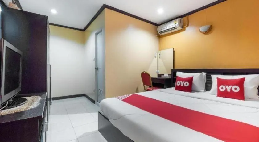 Bed in OYO 75327 Diyana Residence