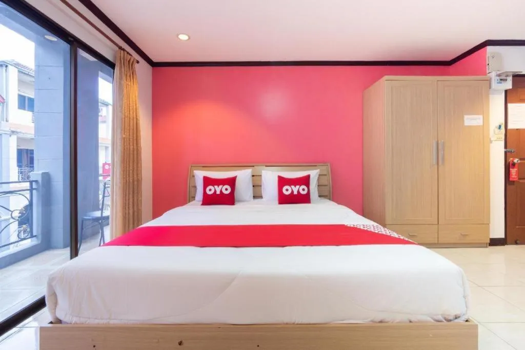 Bed in OYO 75327 Diyana Residence