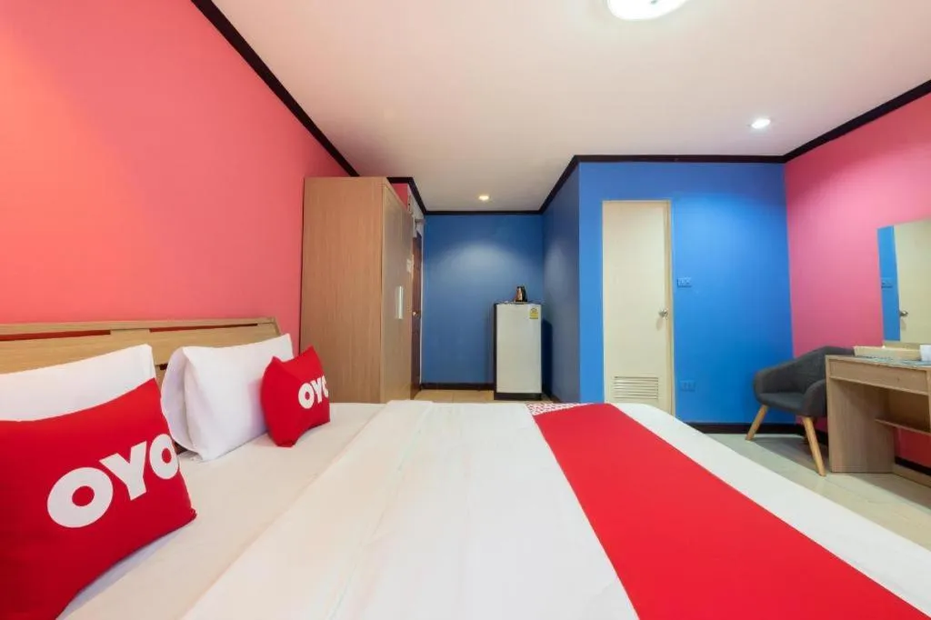 Bed in OYO 75327 Diyana Residence