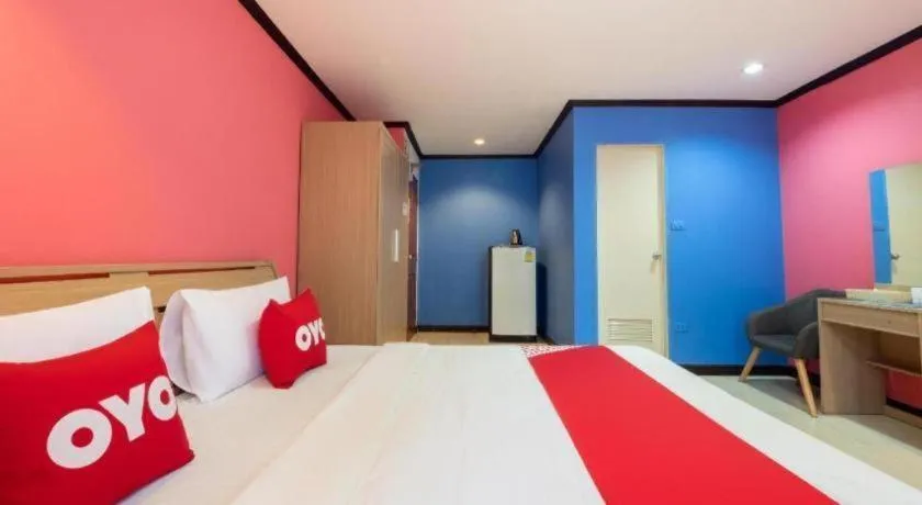 Bed in OYO 75327 Diyana Residence