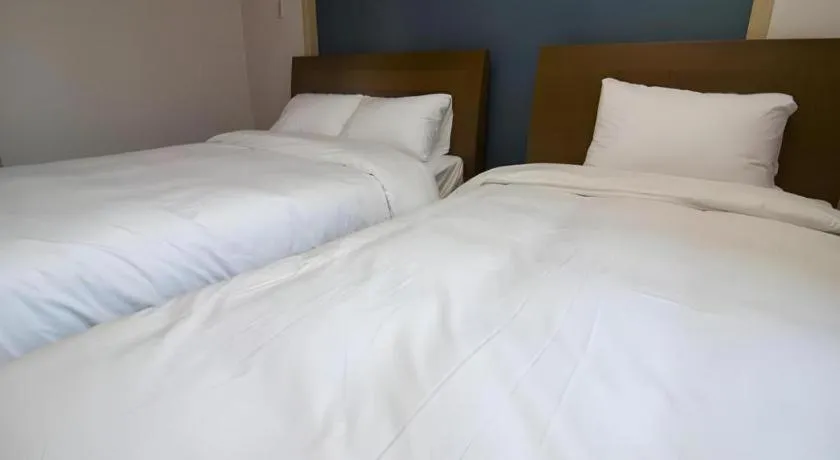 Bed in Hyundai Elliot Hotel and Resort