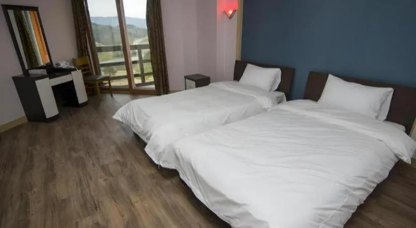 Bed in Hyundai Elliot Hotel and Resort
