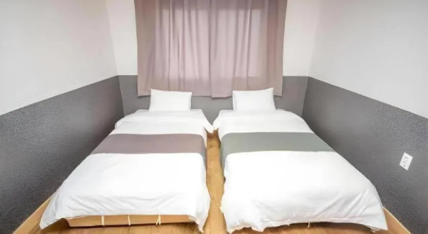 Bed in Hyundai Elliot Hotel and Resort