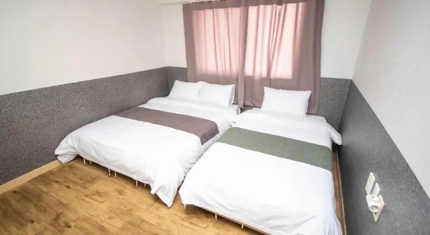 Bed in Hyundai Elliot Hotel and Resort