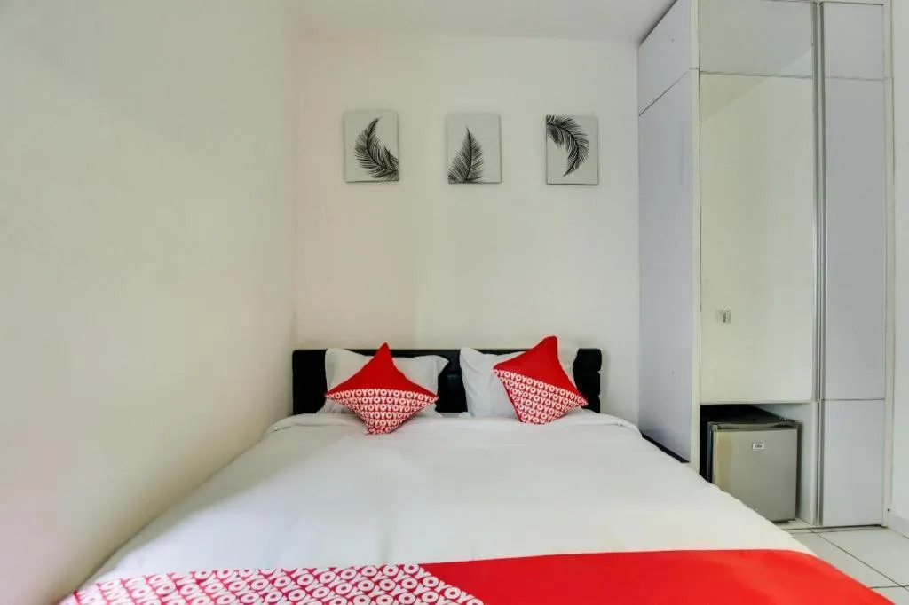 Bed in OYO 3247 Afira Rooms Aeropolis