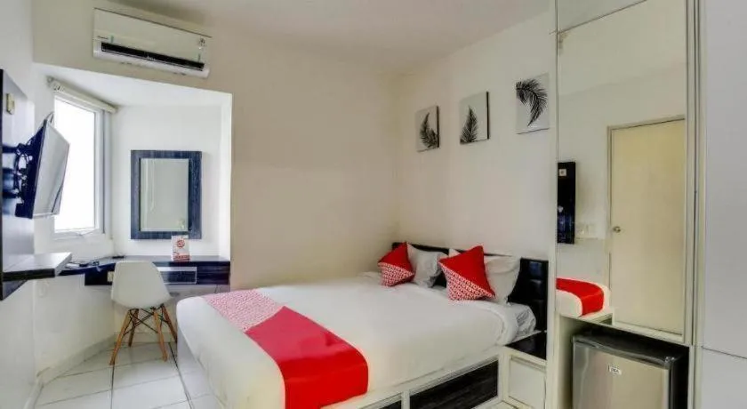 Bed in OYO 3247 Afira Rooms Aeropolis