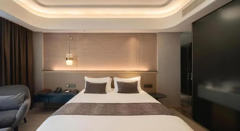 Bed in Taiyi International Hotel