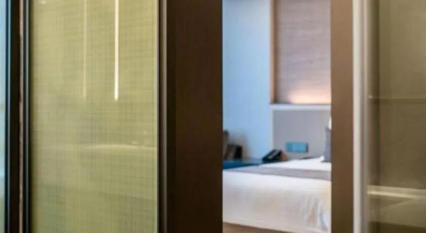 Bed in Taiyi International Hotel