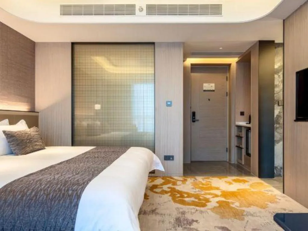 Bed in Taiyi International Hotel