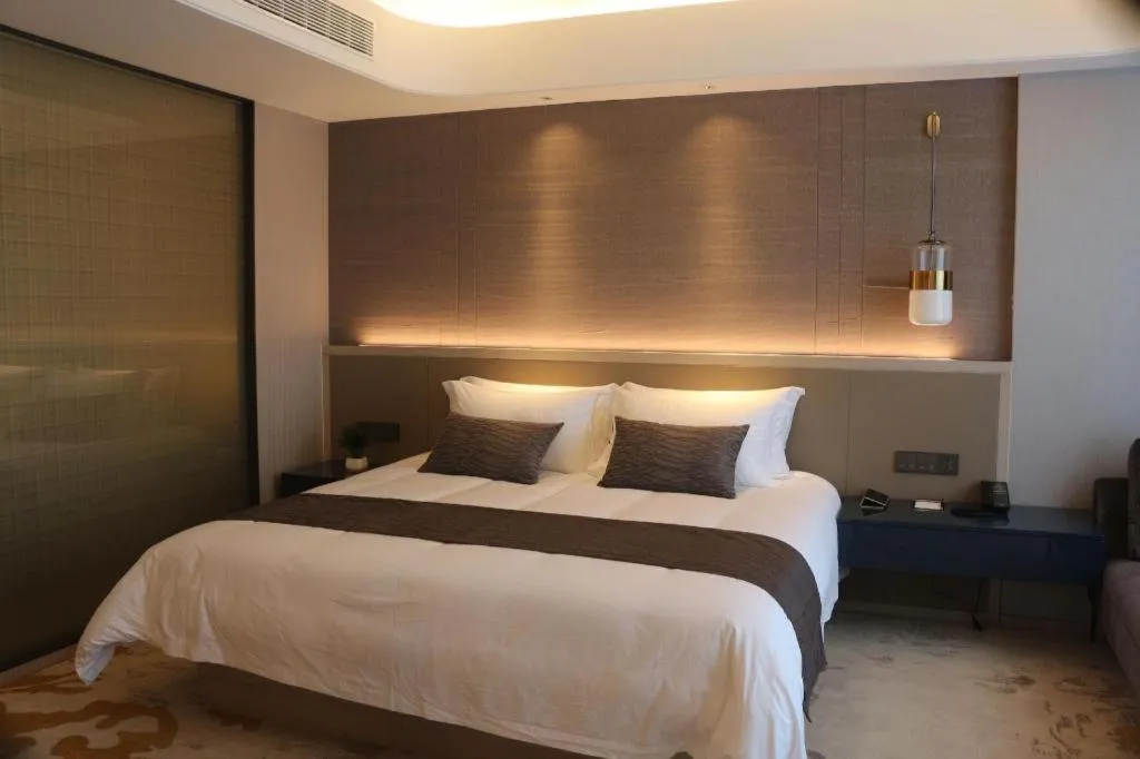 Bed in Taiyi International Hotel