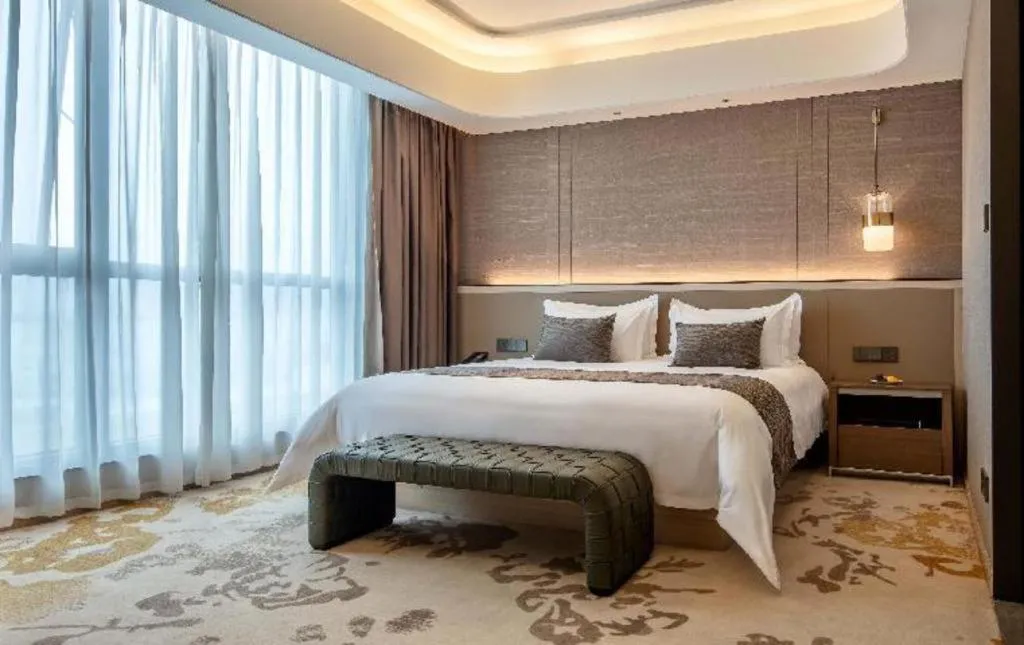Bed in Taiyi International Hotel