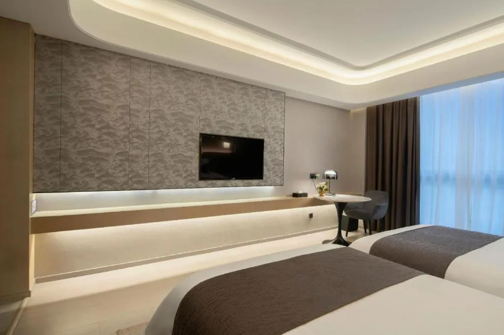 Bed in Taiyi International Hotel
