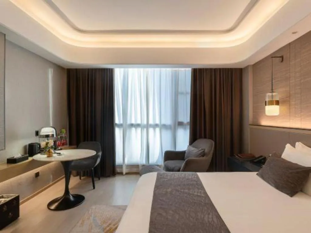 Bed in Taiyi International Hotel