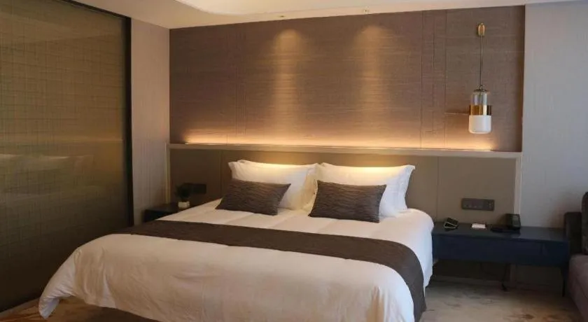 Bed in Taiyi International Hotel