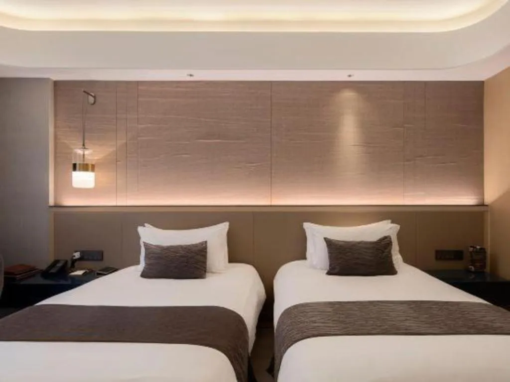 Bed in Taiyi International Hotel