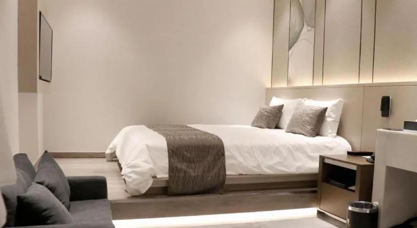 Bed in Taiyi International Hotel