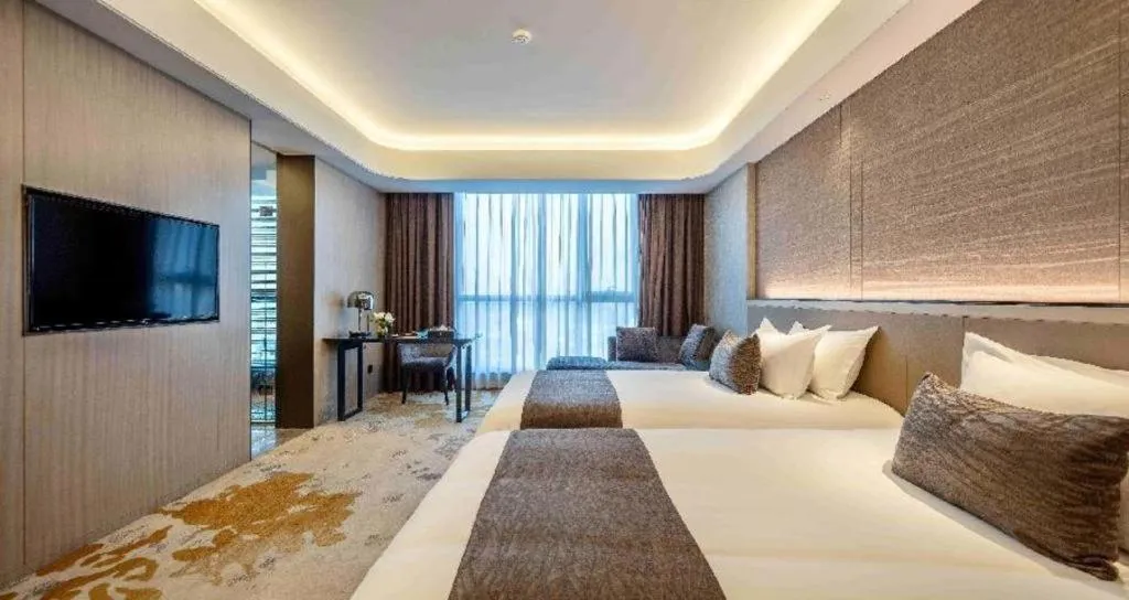 Bed in Taiyi International Hotel