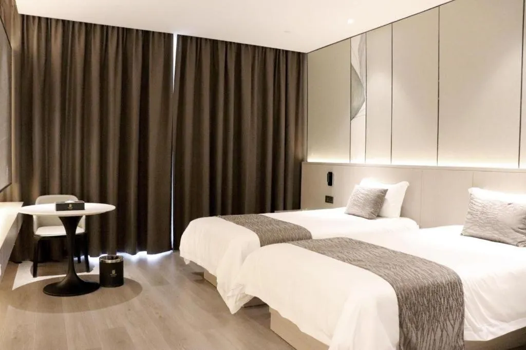 Bed in Taiyi International Hotel