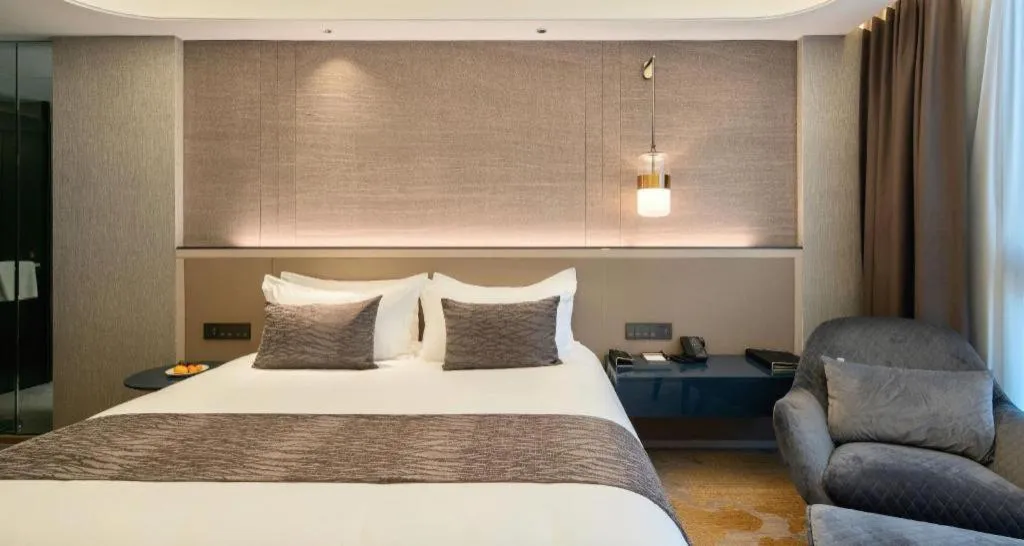 Bed in Taiyi International Hotel