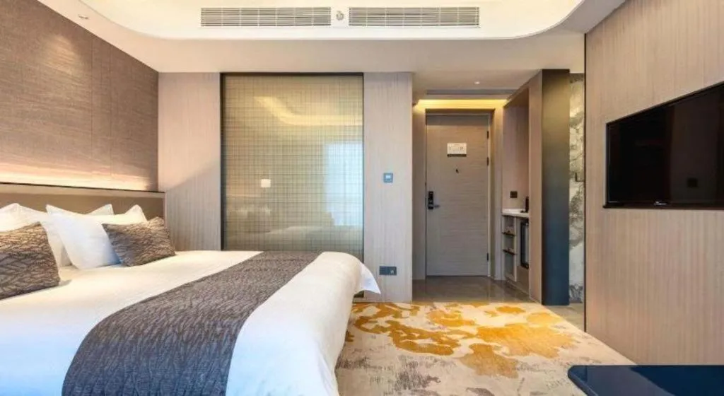 Bed in Taiyi International Hotel