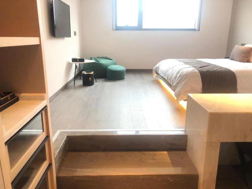 Bed in Taiyi International Hotel