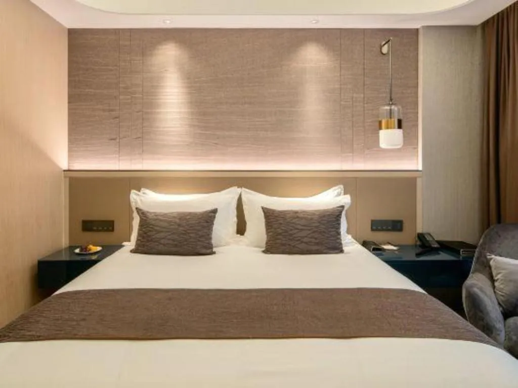 Bed in Taiyi International Hotel