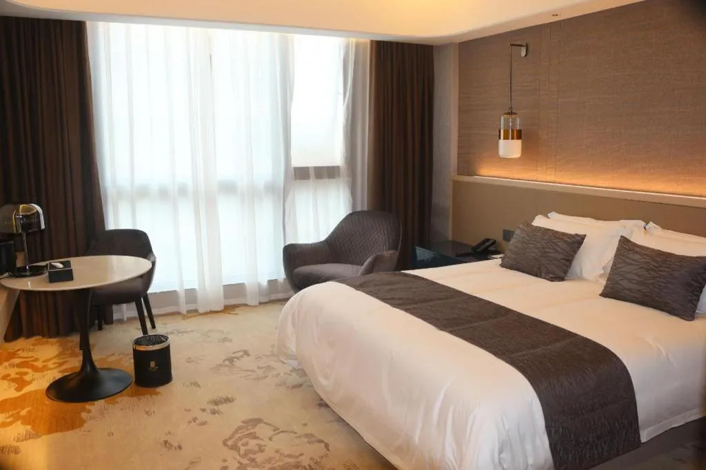 Bed in Taiyi International Hotel