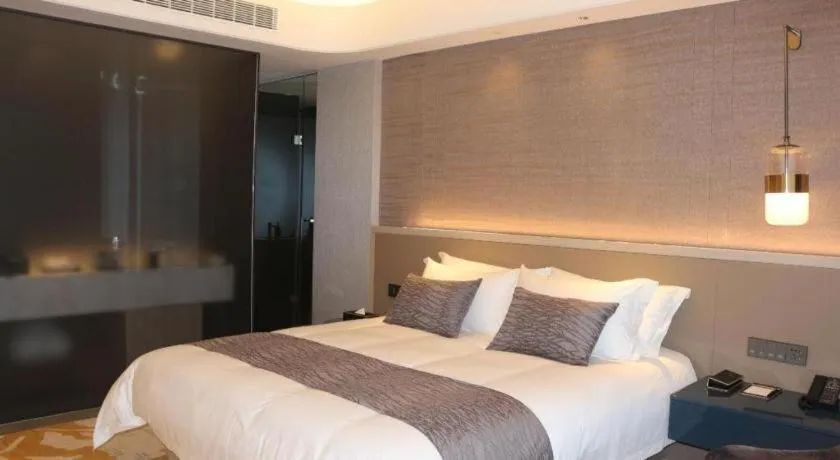 Bed in Taiyi International Hotel