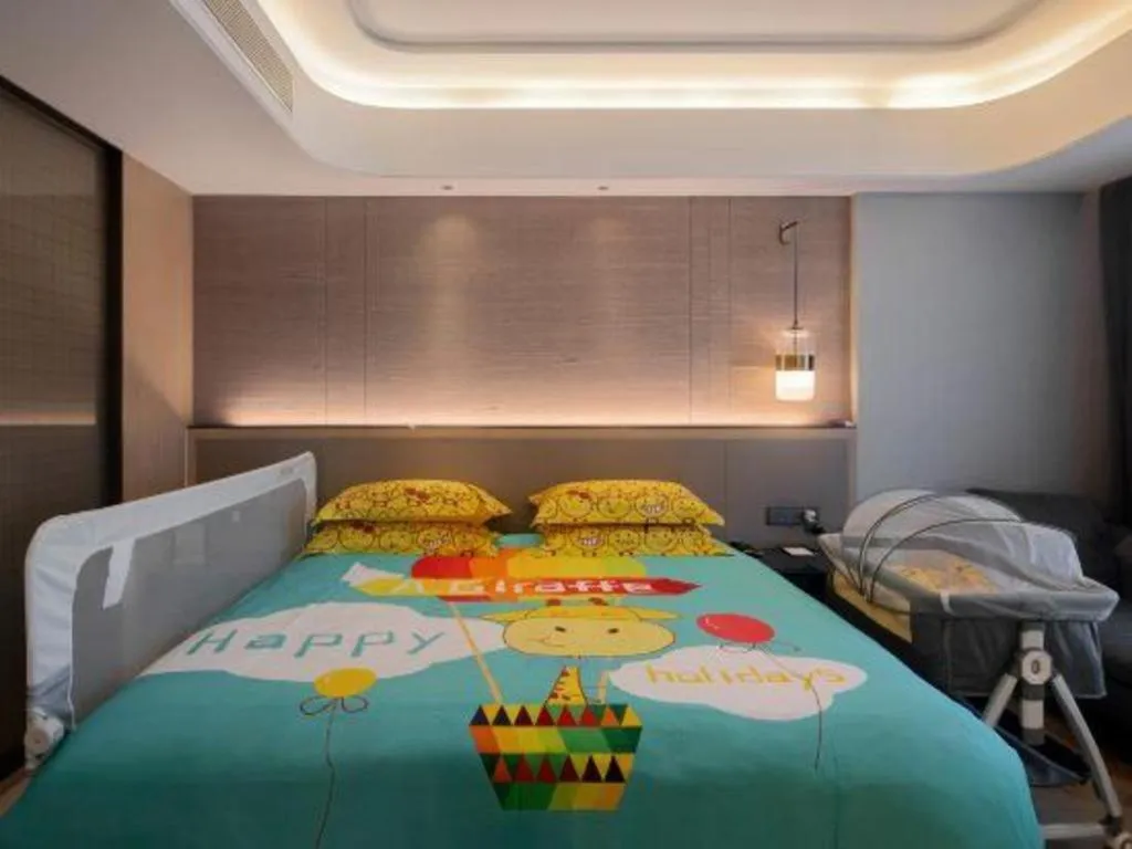 Bed in Taiyi International Hotel