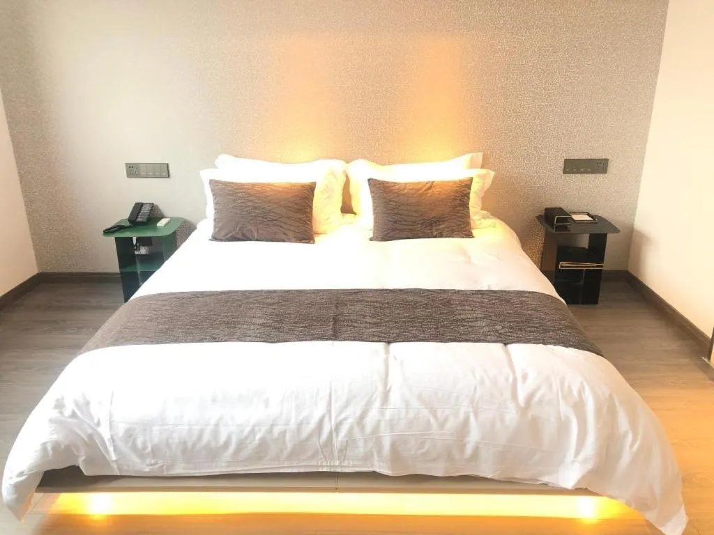 Bed in Taiyi International Hotel