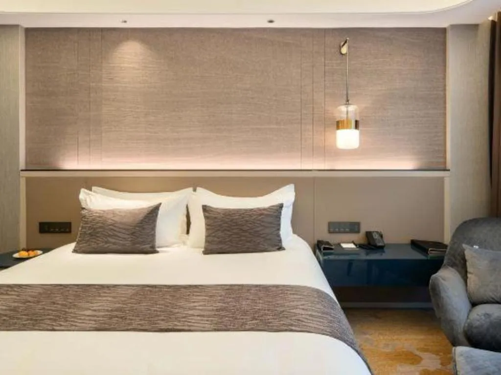 Bed in Taiyi International Hotel