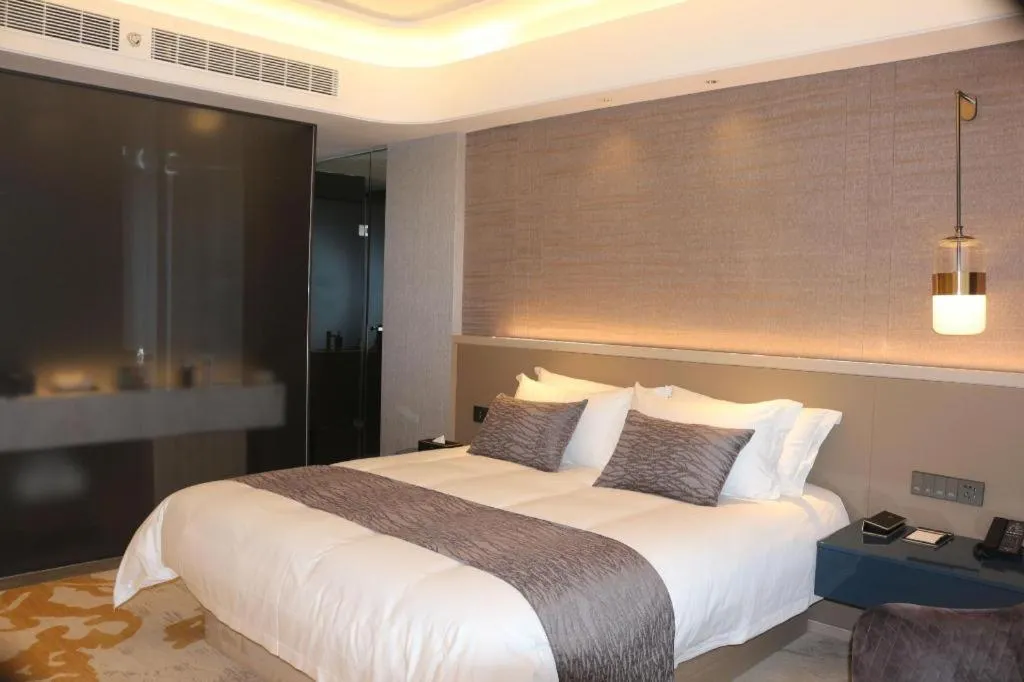 Bed in Taiyi International Hotel