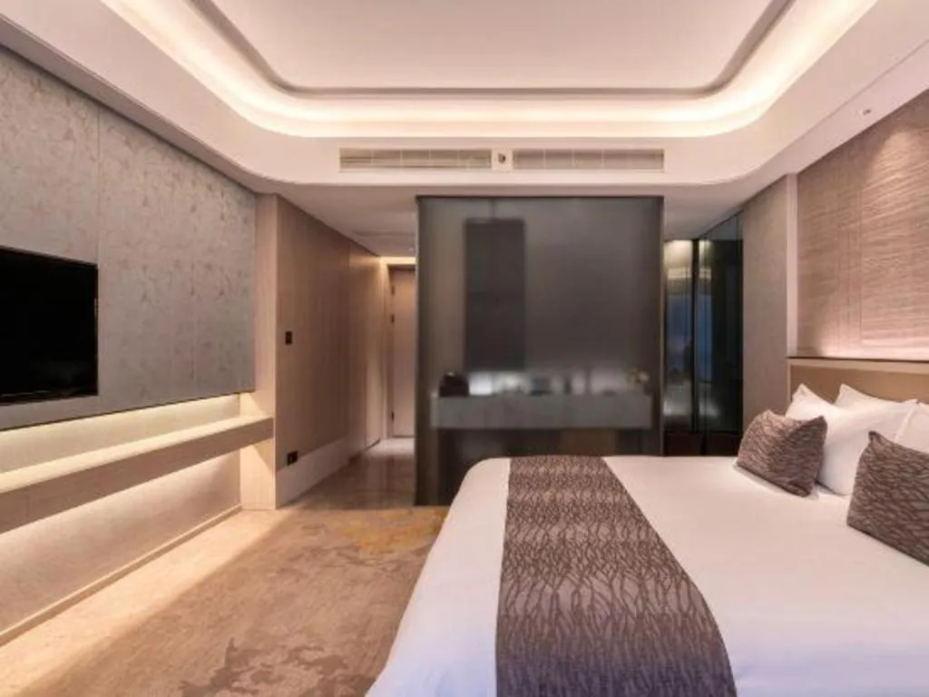 Bed in Taiyi International Hotel