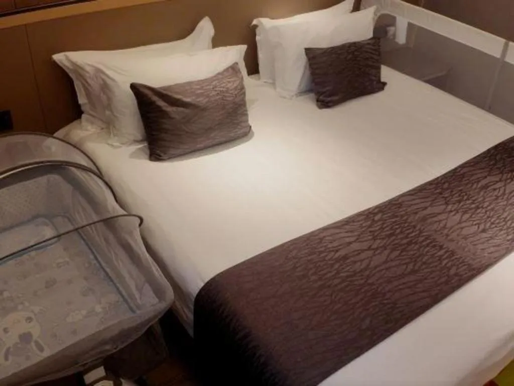 Bed in Taiyi International Hotel