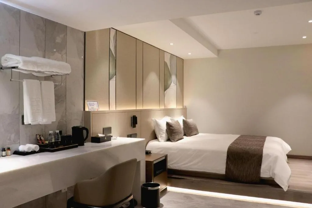 Bed in Taiyi International Hotel