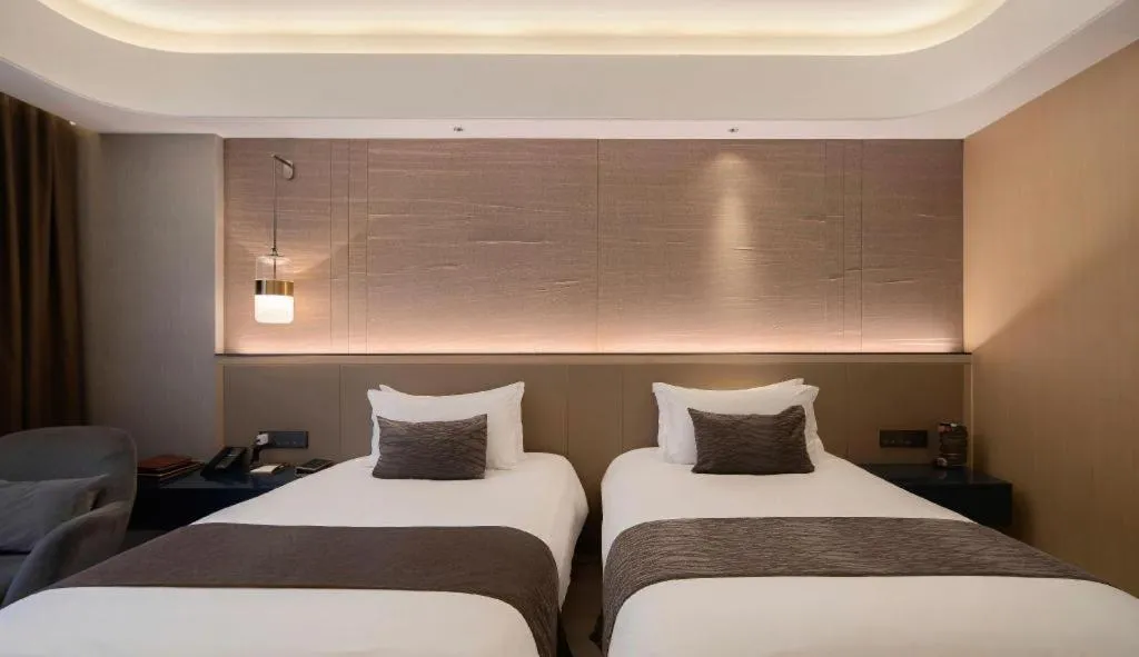 Bed in Taiyi International Hotel