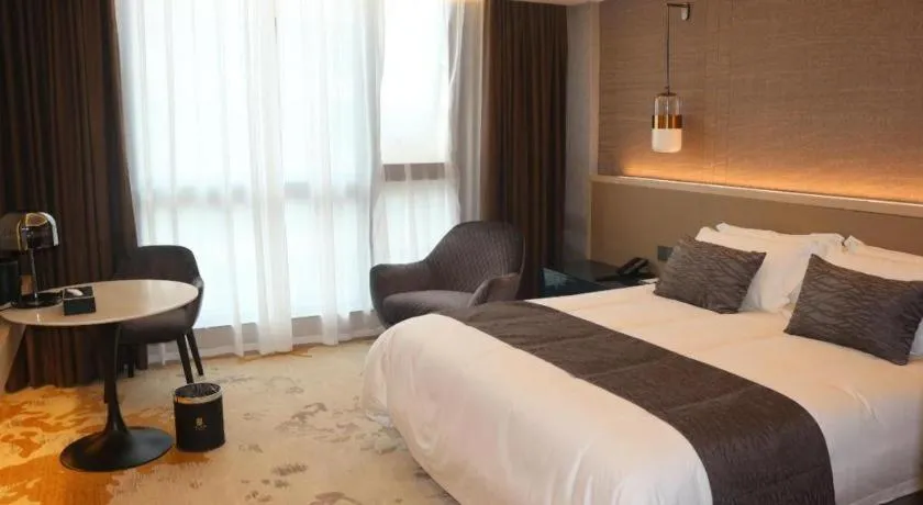 Bed in Taiyi International Hotel