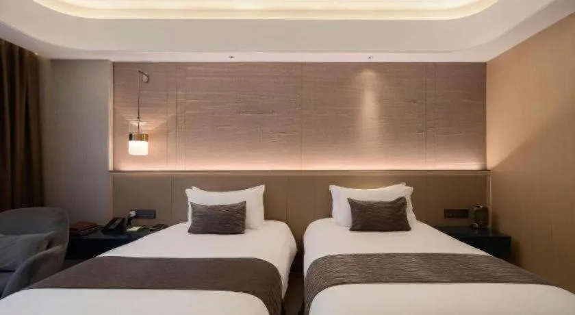 Bed in Taiyi International Hotel