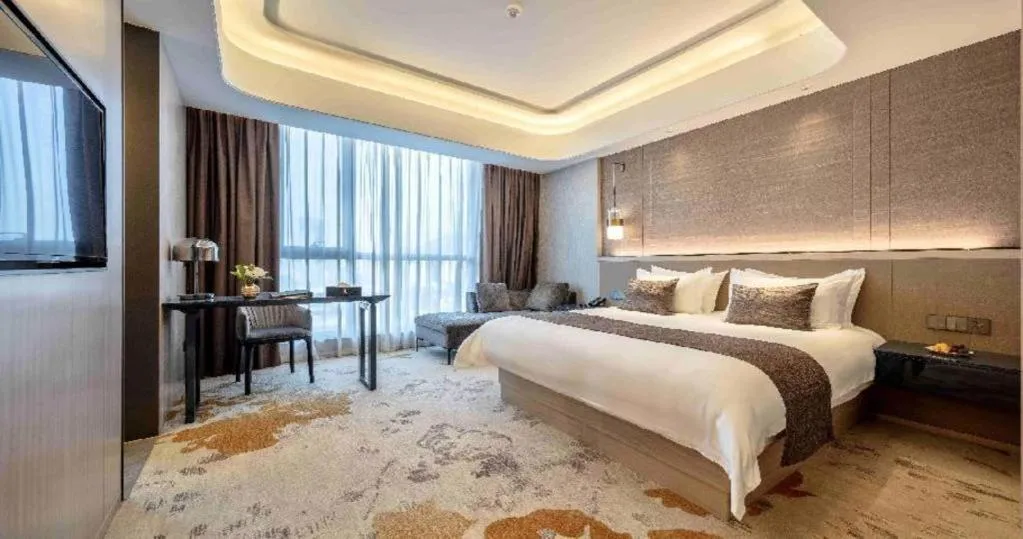 Bed in Taiyi International Hotel