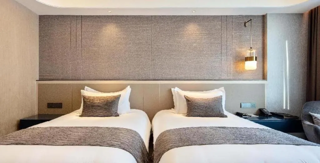 Bed in Taiyi International Hotel