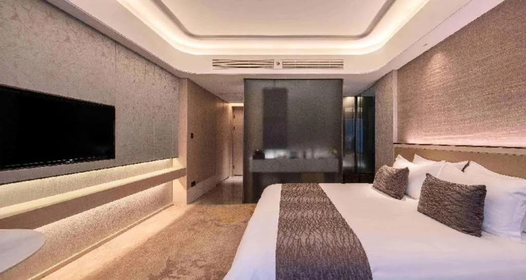 Bed in Taiyi International Hotel