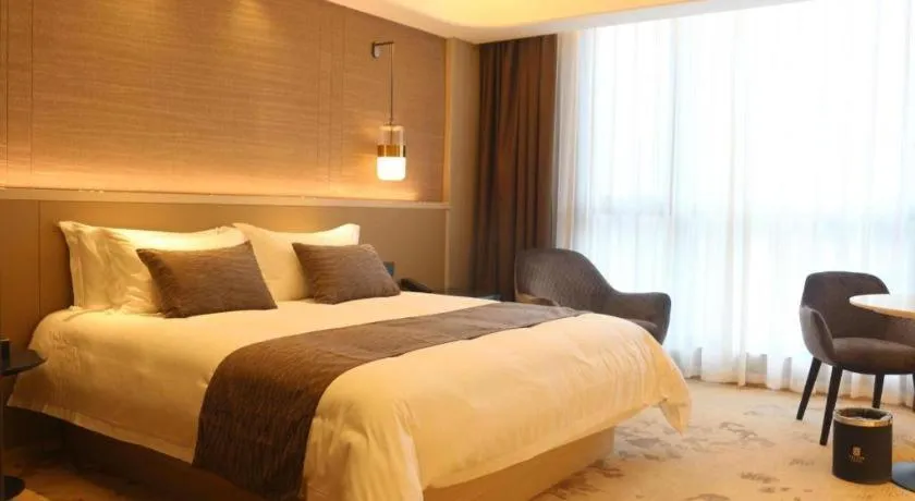 Bed in Taiyi International Hotel