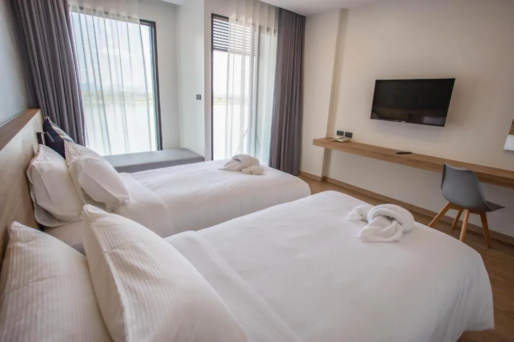 Bed in Chewa Khong Hotel Nakhon Phanom