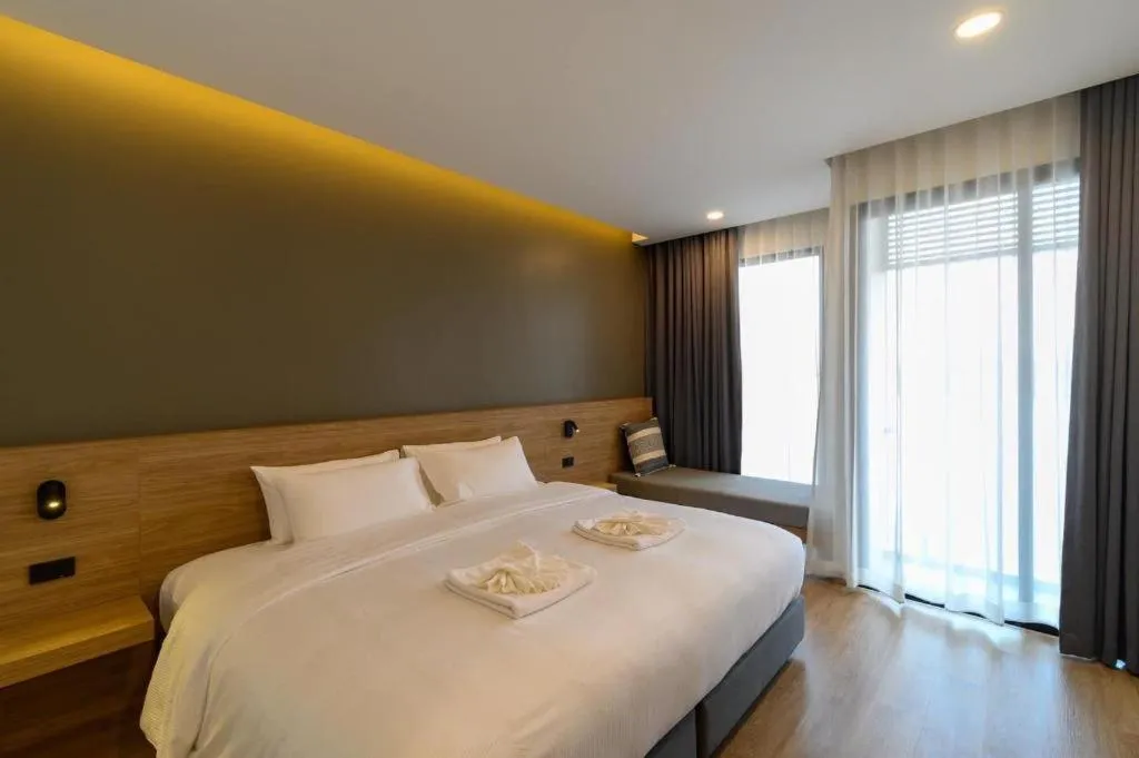 Bed in Chewa Khong Hotel Nakhon Phanom