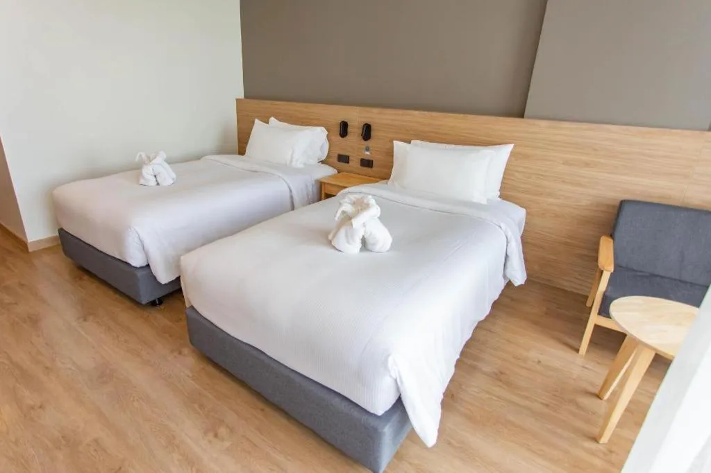 Bed in Chewa Khong Hotel Nakhon Phanom