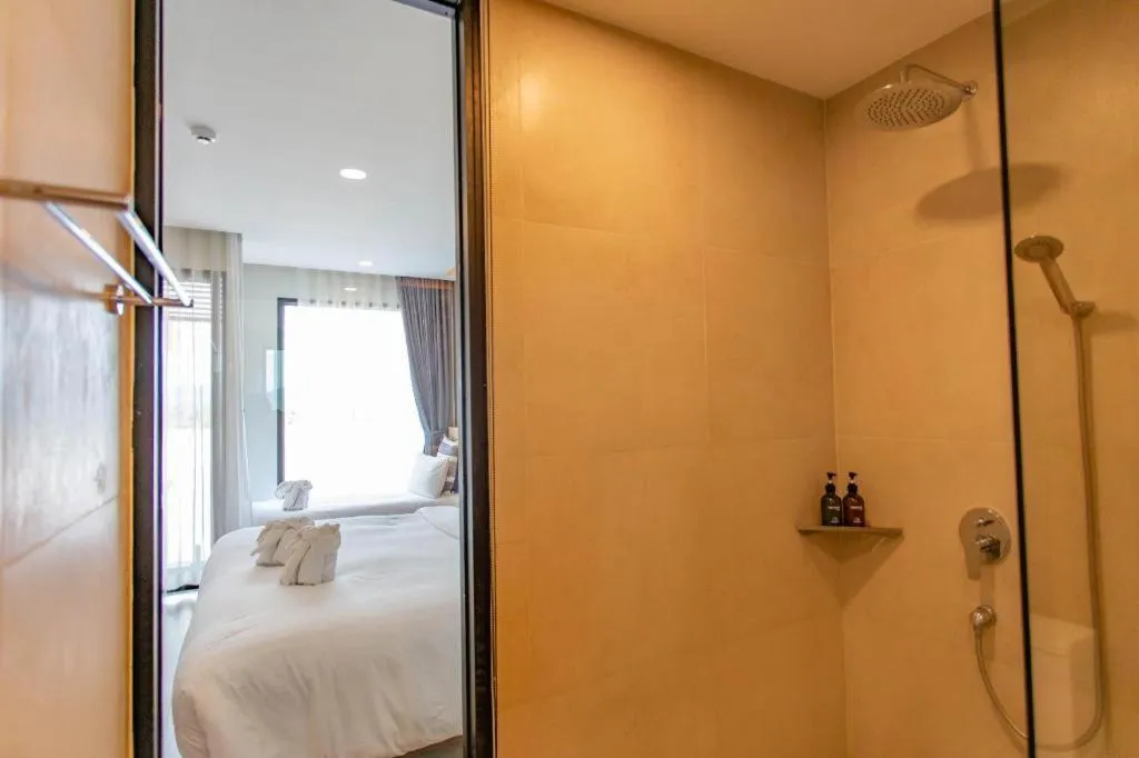 Bed in Chewa Khong Hotel Nakhon Phanom